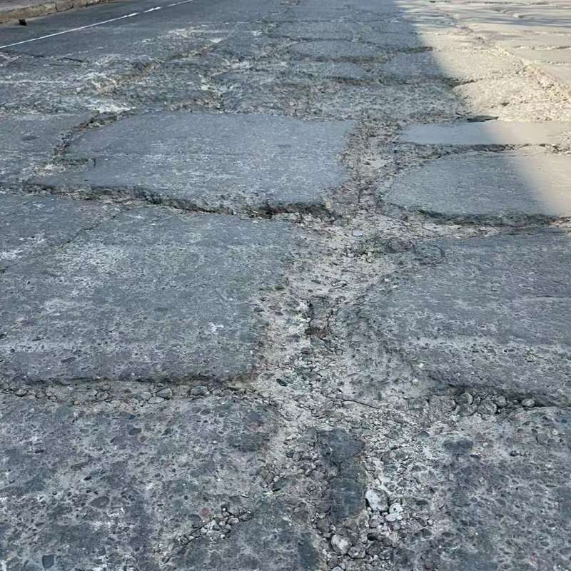 西岗路面起砂露石子修补料
